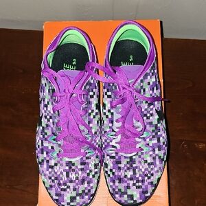 Nike Purple and Green Athletic Shoes with Unique Pattern